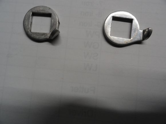 Note the position of the stop in the left one.  It allows for more return if the shift lever if you are using the older style of lever.  The right one is correct for the older levers which have less cable wrap up than the newer levers.