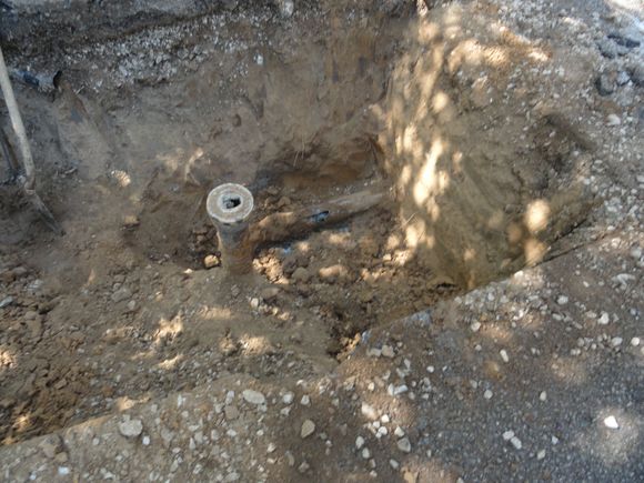 Excavation under driveway found this. A third clean-out that was filling up with gravel regularly until it failed.
