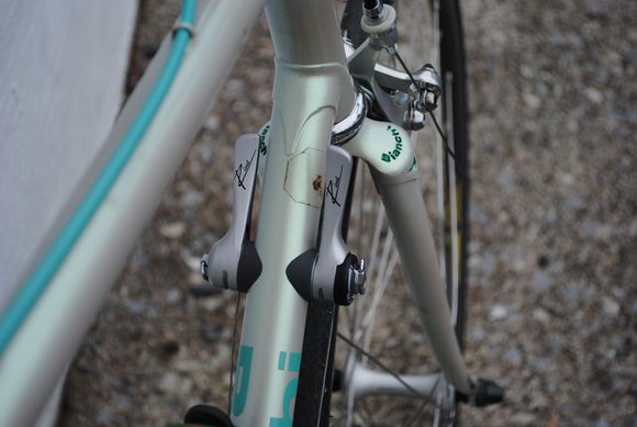 Sory for the lousy indoor pic but the weather was horrible that day.  Despite the seller's claims of being "all original" it was a hot mess with mixed up gear.  I made it beautiful with that Athena group but just couldn't make it work, especially the reach part.  