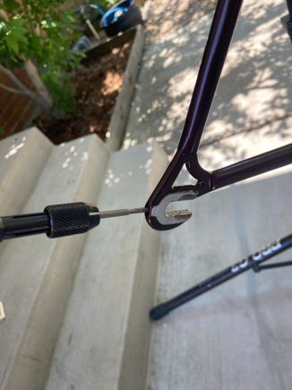 Chasing these threads and switching to the shortest 3mm hex bolt that allows for adjustment of the wheel for centering will save you a lot of headaches.