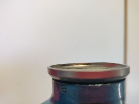 Maybe with a piece of threaded rod, some nuts and washers... I have no experience with this. I would have standard sized threaded headset cups, which, according to Sheldon Brown, might fit in the head tube, but this would cause problems with the French sized fork and threads. 