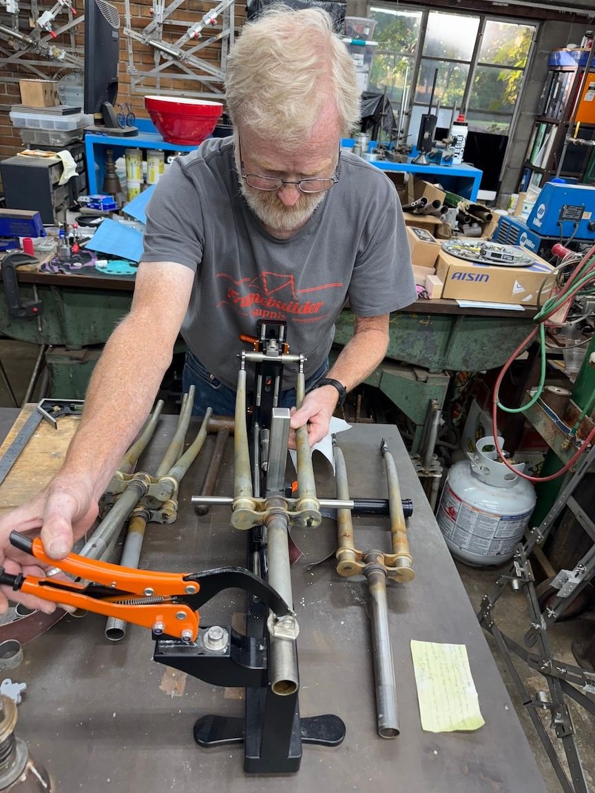 Andy was checking and adjusting alignment for each fork after the crown parts were brazed