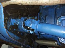 78 K5 . Looking back from inside of front right wheel to double cardan joint fastened to transfer case.

Two U joints connected with a ball joint in between.