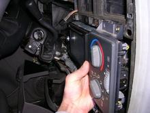 After about an hour of tearing out the plastic behind the head unit, there is finally enough room for the double din to sit flush with the AC controls