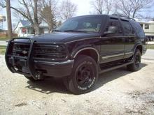 spring clean up. I painted the stock rims with semi-gloss rustoleum spray paint, and I also painted the grill also. I also added coil overload shocks on the rear to level it out.