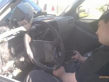 Here is my oldest son Troy installing a new Aiwa stereo in the Jimmy, it sounds 100% better than the stocker, and he's happy he has a CD player and audio input for his Ipod.