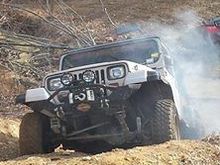 Smoking up the mud tires on a rock hillclimb.