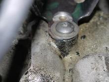 P1020212, Note, new Delphi FJ10565, Came with new bracket, different, no prong to stick down in hole to hold on place, added washer to keep assemble from come off screw, screw is tight, bracket will not move, should I lose'n  ?