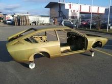 After removing remaining paint and rust and treated with a primer (Doltan)