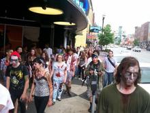 ZOMBIE WALK..every year in Nashville,TN..100's of ppl dress as the undead and walk the streets..its fun..but tireing..

so if i had a zombie vehicle, it would be easier, to dress as tactical strike team and drive around..
