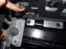 14 - This spring is the glove box catch, lift it to drop box