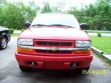 Stock front before I painted turn signals and bowtie black and added westin light bar with 2 BAJA lights