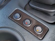 I spray painted the panel with "Rustoleum Metallic Oiled Rubbed Bronze" before putting switches and and then put the panel in the console...