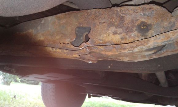 This is there the adjustment bolt & bracket went.
