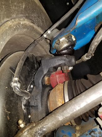 Please notice upper ball joint angle and boot is separated w/1 mile driven