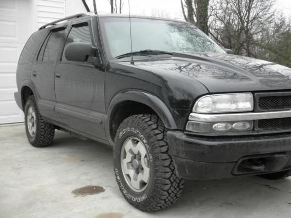 Nothing to fancy at this point ..Goodmark cowl hood.Black SS grill inserts.Black Bow Tie.Black corner marker lights and black Euro tails ..Goodyear Duratracks 235/75/15