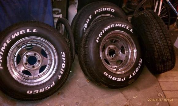 This is my new set of rims and tires. Tires are still the 235/70/15 and the rims are 15x8. I think they are going to look pretty good on the blazer.  They are going to stick out a little because of the back spacing, but that's what I wanted anyway.