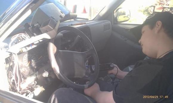 Here is my oldest son Troy installing a new Aiwa stereo in the Jimmy, it sounds 100% better than the stocker, and he's happy he has a CD player and audio input for his Ipod.