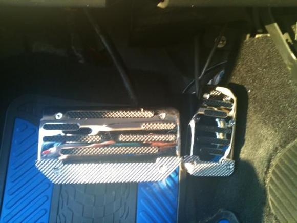 Gas pedal and brake.