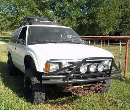 210k miles now...custom prerunner bumper-thumper, lights,  and fiberglass fenders.