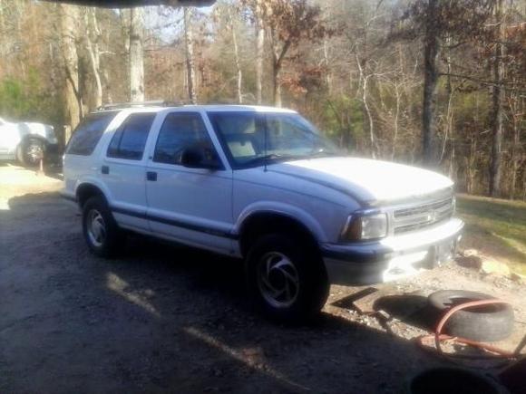 Basic White Blazer with a bad engine.