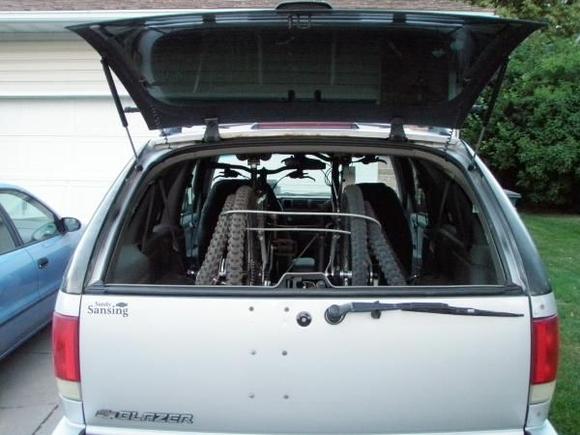 All 4 wheels are cabled together, and another cable is looped through the fork mounts.