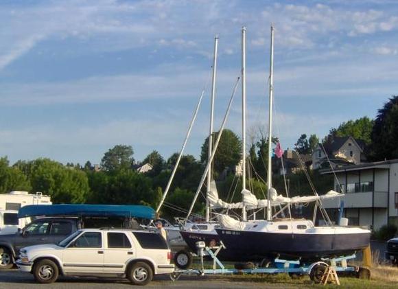 Rigging the sailboat before launching in Bellingham Bay, Washington.