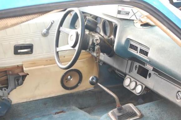 Interior which is now almost completely gutted except for the  dash