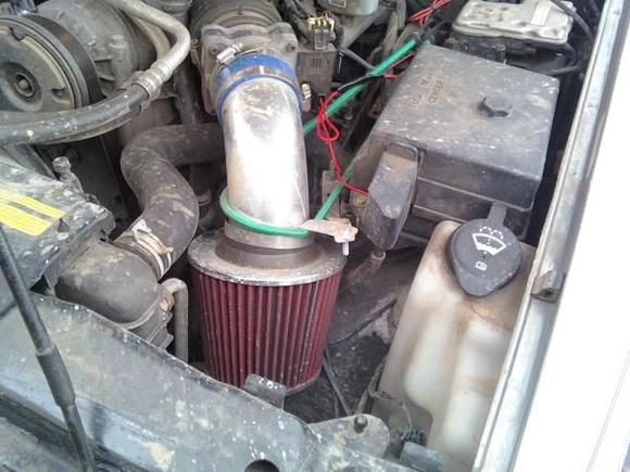 blazer intake. Held up with a bungie cord but it works