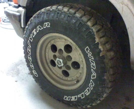 dirty wheels with new goodyear duratracs.....gonna polish them up and put a lil paint on them