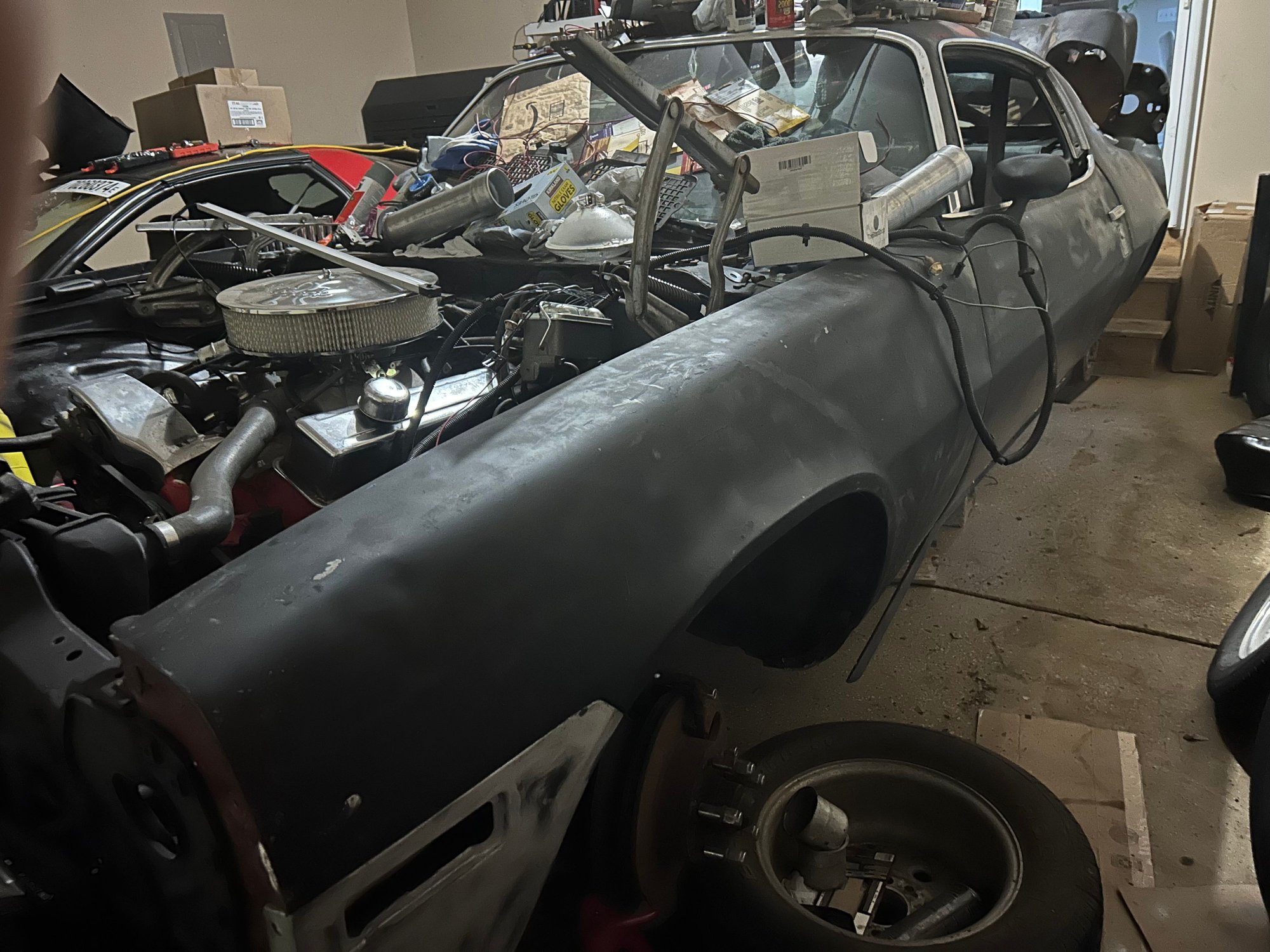 after completing some body filler and attaching one of the hood hinge springs