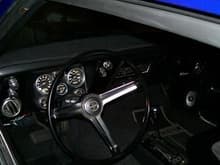 Went with Covan Classic Gauge Cluster. Still looks clean, but supplies much more info then the original gauge cluster.