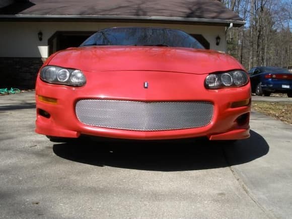 Front view with sport grille and halo projector headlights