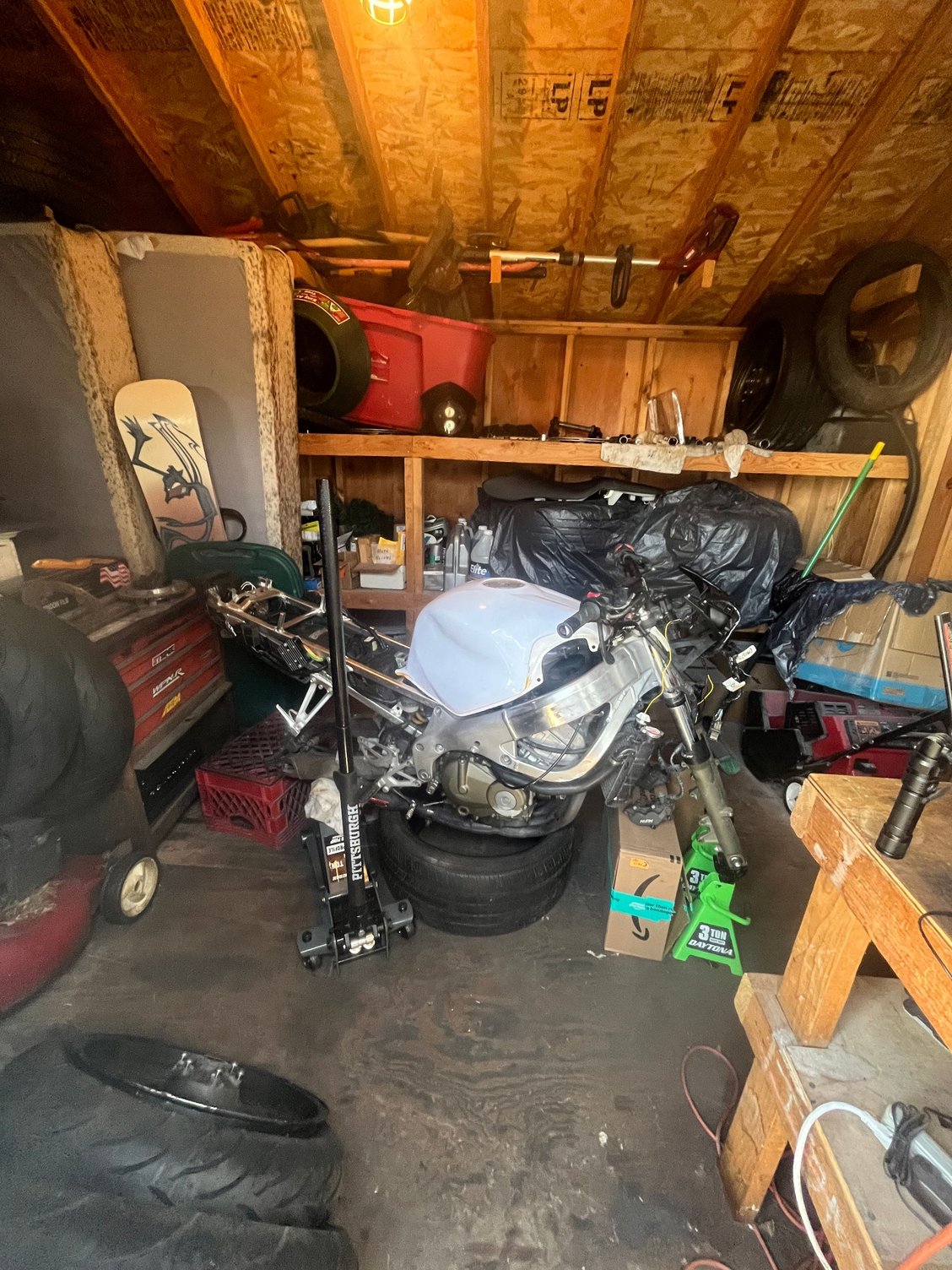 sat like this while i waited for wheels, had to get clever to get the wheels back on without the proper jacks or straps from ceiling 