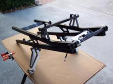 F4i split-seat subframe w/ passenger pegs &amp; rear keylock cable mechanism installed.