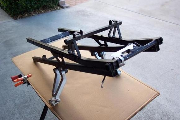 F4i split-seat subframe w/ passenger pegs &amp; rear keylock cable mechanism installed.