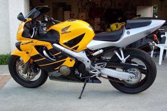 Viola!!! :D  Completed F4 to F4i split seat subframe tail conversion.  A couple of notes here...  If you still have a factory exhaust, you will have to fab up a new bracket to mount to the F4i rear pegs.  If you already have an aftermkt exhaust can, simply move your bracket back to mount.  Ok, you're done...TAKE PRIDE IN YOUR ACCOMPLISHMENT &amp; ENJOY!!! :D