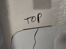 Does anyone know where water could be coming from under the top panel onto the bottom panel as shown in picture?