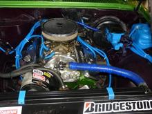 350 with headers and edlebrock intake and holly carb....