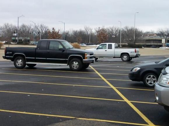 Mines the black one.  I just thought it was cool that I spotted the same truck as mine except it's white haha.