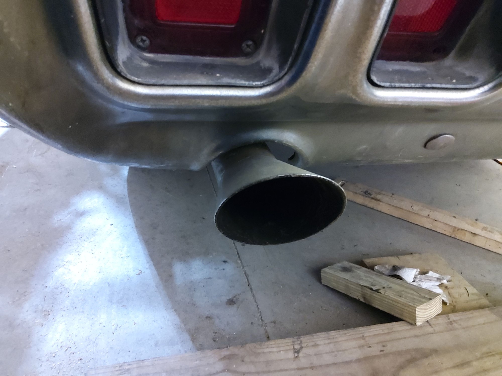 Center in the bumper cut-out.