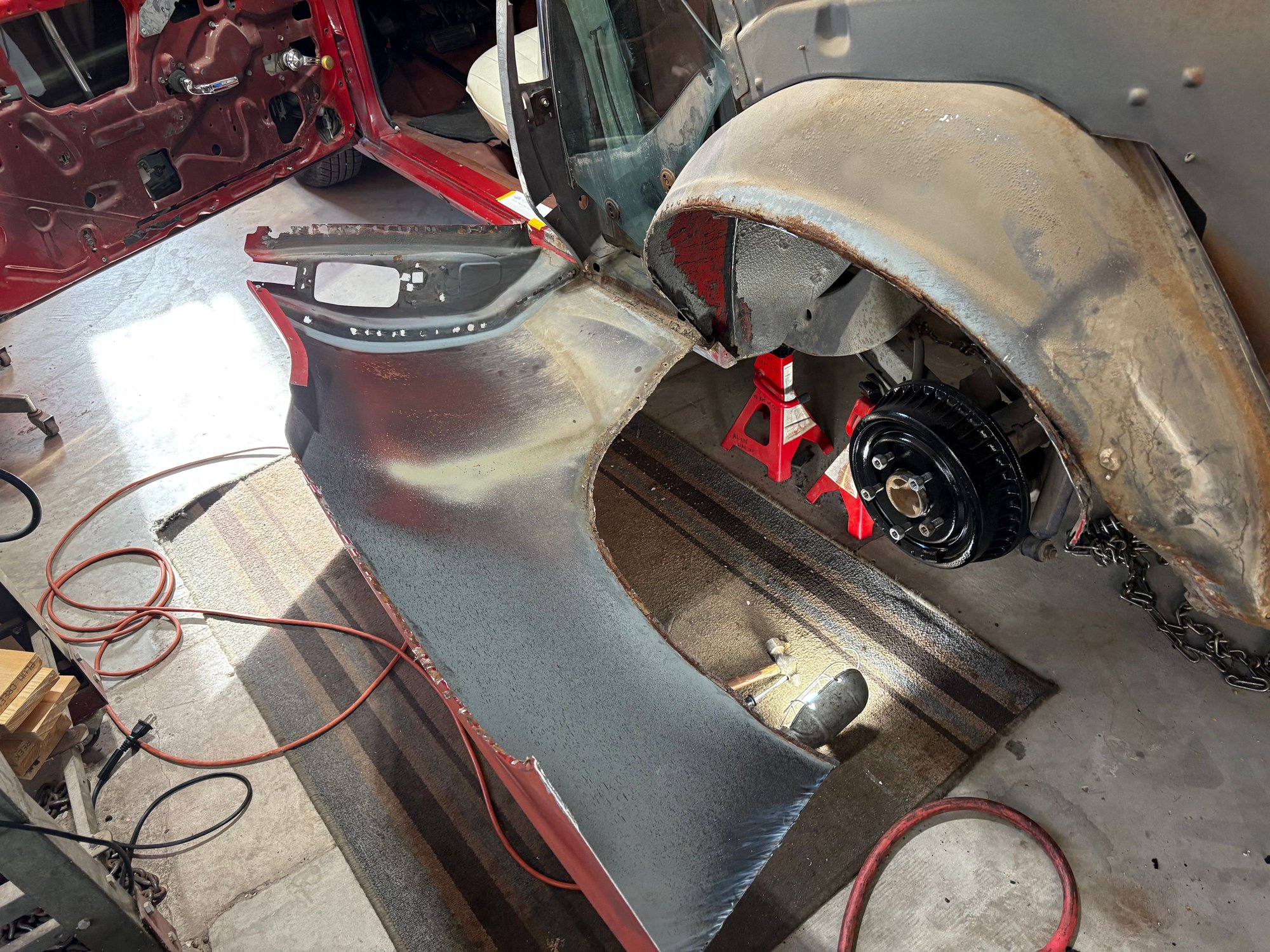 Now I could fold the panel down and figure out how the bottom forward of the wheel was attached.