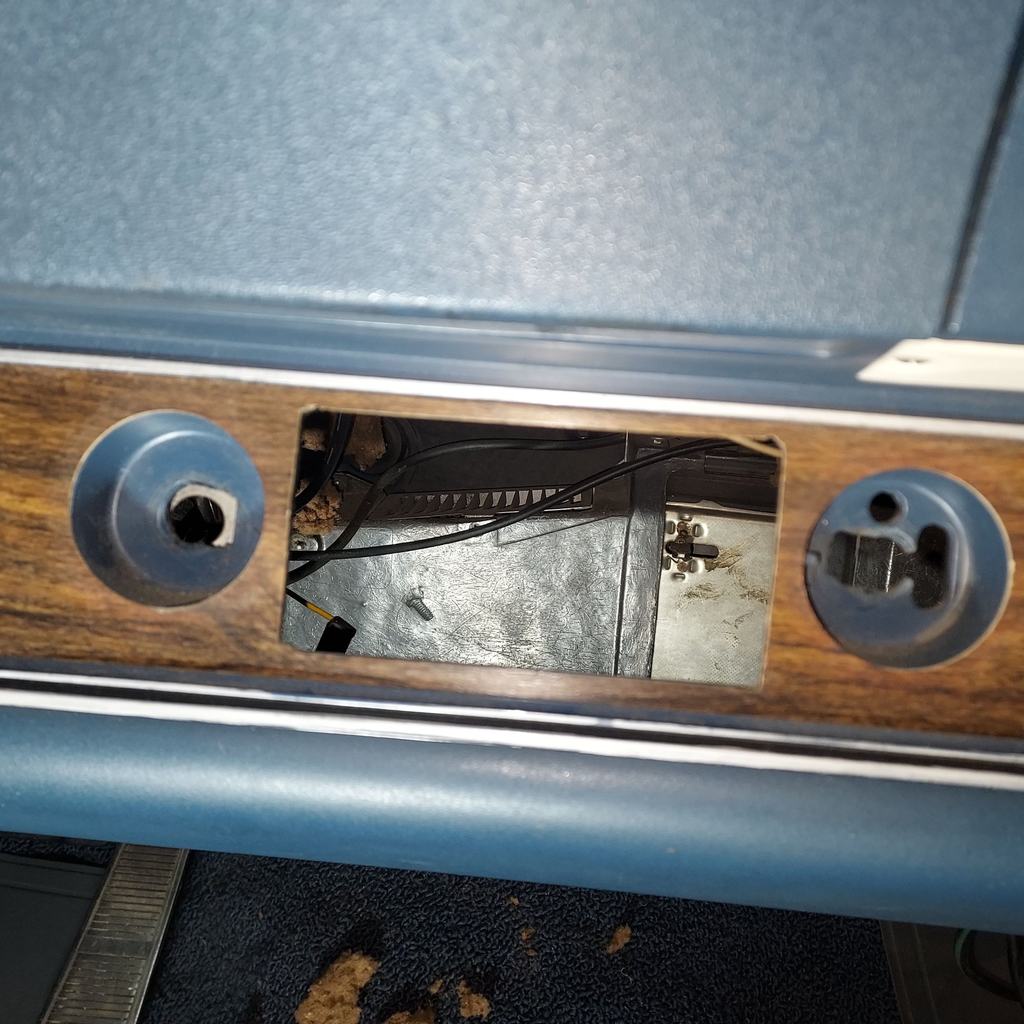 Look carefully and you can see how the original radio opening and trim as opened up slightly back in the day for a aftermarket stereo. Since I've had car original AM was in  there. You could barely see the enlargement, but you could if looking closely. I hope replacing just the wood trim will make it look perfect after radio reinstalled- AMFM Stereo this time.