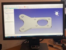 Drawing up the rear caliper bracket in FreeCad. This is a preliminary drawing and the bracket will become a 2 piece giving me the ability to shim/adjust caliper offset to rotor. 