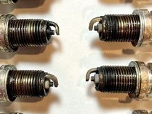 I pulled the spark plugs to read the AF mixture; they all seem to be rich. Not sure whats going on with cylinder #3, looks a bit fouled. This is the first time to pull the plugs since engine break-in.  Could it be cause by poor ring sealing during break-in?