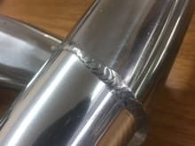 Close up of one of the two butt welds on the pipe. You may or may not like this. I will match well with your sheet metal intake and welded aluminum valve covers. Of course with that setup you’ll want 2” headers.
