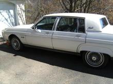 The angle of the car that won me over when I was contemplating purchasing it.  Never seen a car with longer fenders.  Rubbed the paint out and treated rust spots here and there.  Still have to get behind the trim.