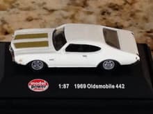 I bought this little guy years ago had it on my work van dash reminding me to keep my eye on the prize and save money. Always wanted a Cutlass 442 this little one is a 69 but check out the one I actually did get. What r the odds.