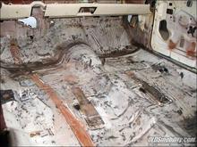 The interior floorpans are cleaned and prepped for paint