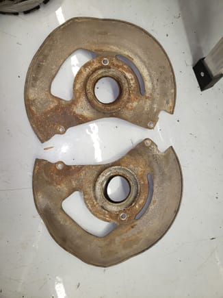 Backing plates from 77 Camaro disc brake spindles.